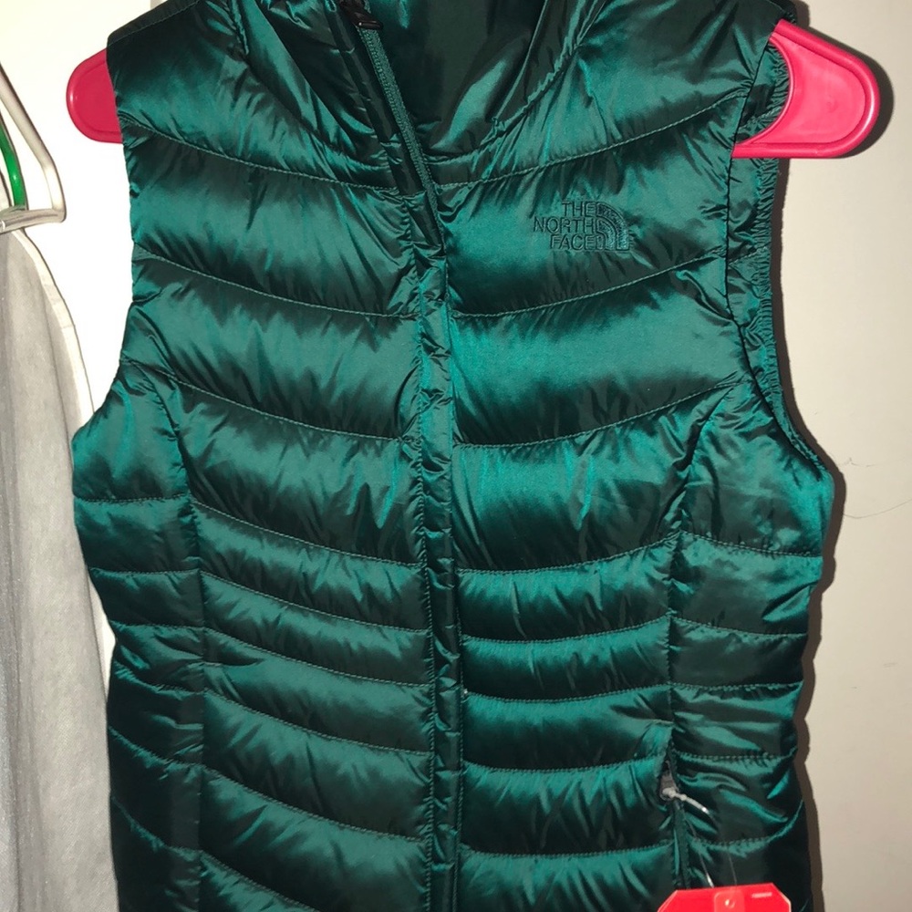 North face vest and New balance jacket